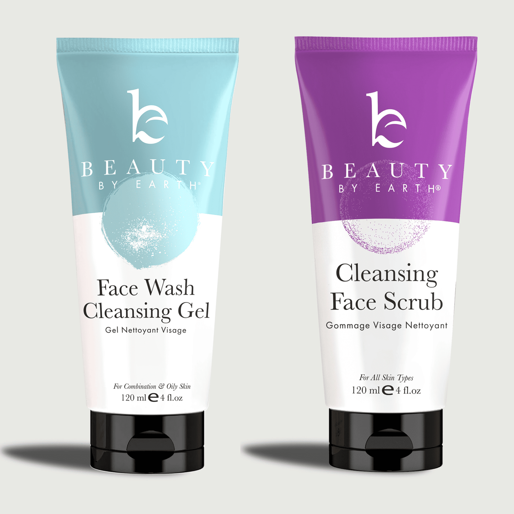 Two tubes of 'Beauty by Earth' skincare products on a light gray background