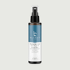 Beauty by Earth hyaluronic acid face toner and facial mist bottle on a light gray background