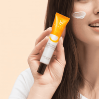 Oil control face moisturizer texture on face and tube in hand