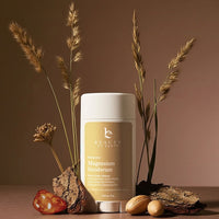 Beauty by Earth magnesium product with decorative elements on a brown background