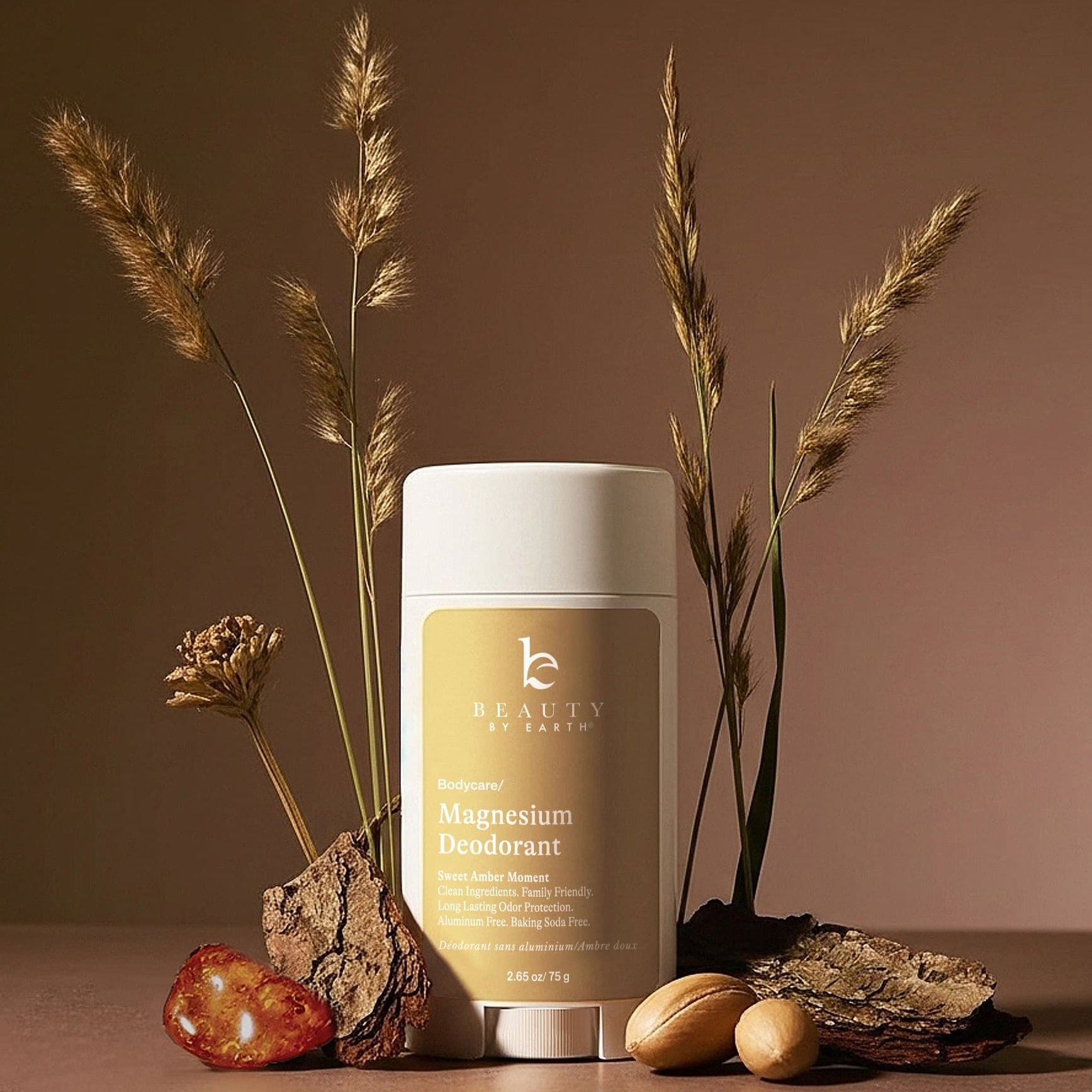 Beauty by Earth magnesium product with decorative elements on a brown background
