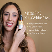 A smiling woman holds a bottle of SPF serum against a warm beige background, with product text and feature callouts on the right.