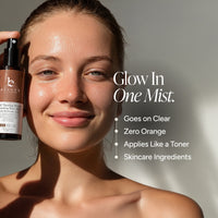 A woman with dewy skin holds a bottle of bronzing Face Mist next to her face. The image features text overlays reading 'Glow In One Mist.