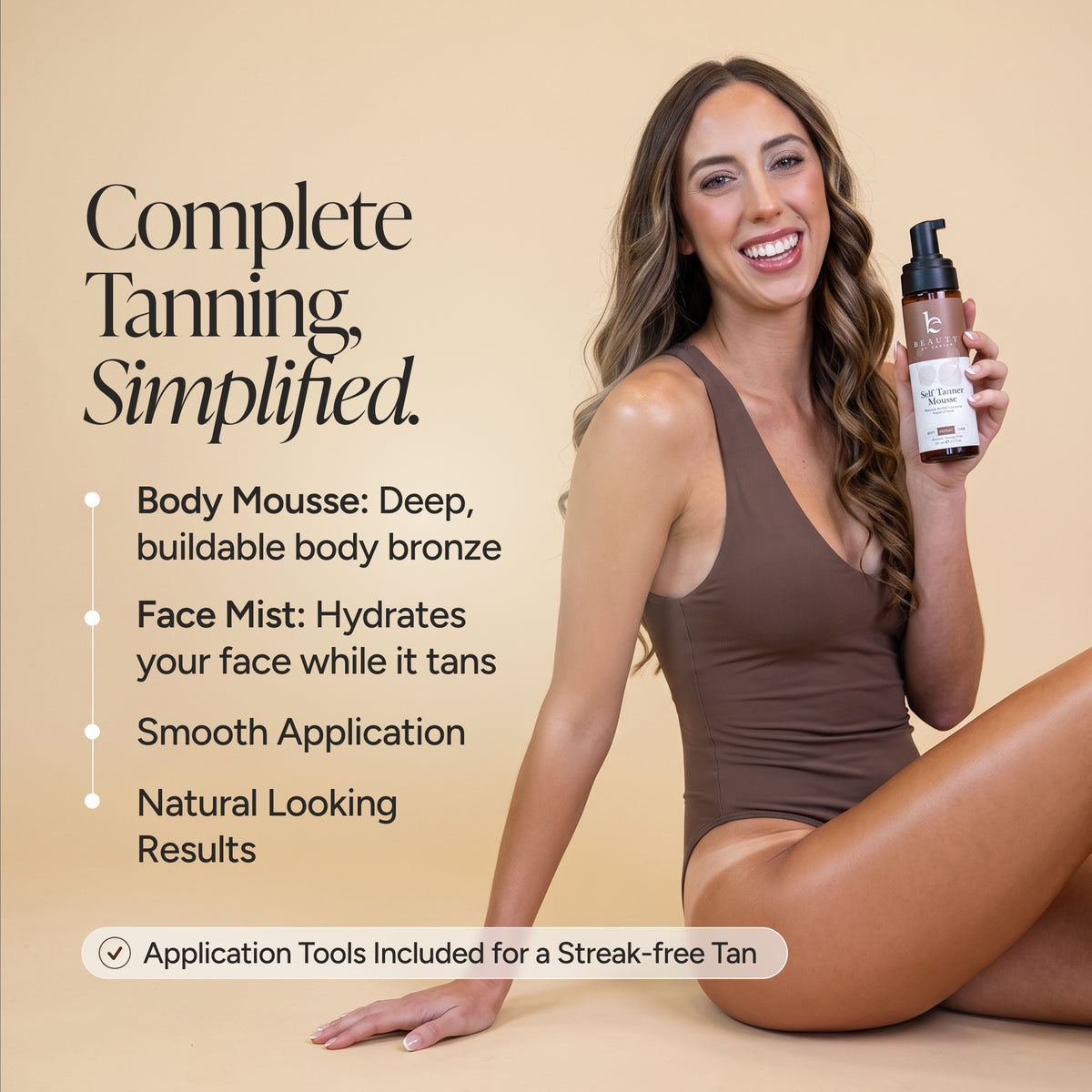 A woman in a brown bodysuit poses on a beige studio background while holding a bottle of body mousse. Large text on the left reads 'Complete Tanning, Simplified.