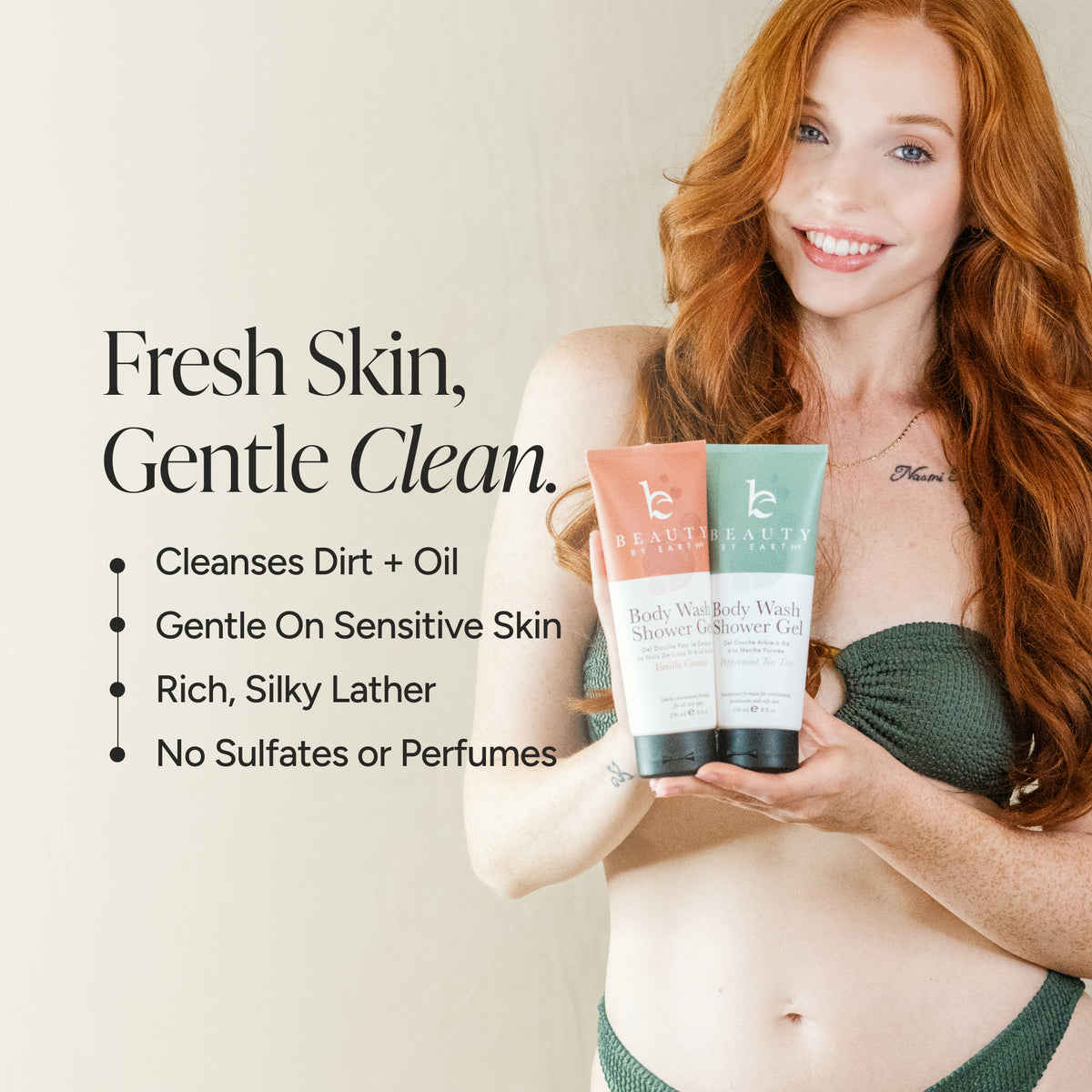 A smiling woman with long red hair holds two tubes of body wash from Beauty By Earth in front of her. The image includes marketing text on the left: 'Fresh Skin, Gentle Clean.