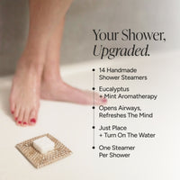 Promotional graphic for shower steamers featuring a person's feet and a small square dish of white steamers on a woven mat. Text on the right reads, 'Your Shower, Upgraded.