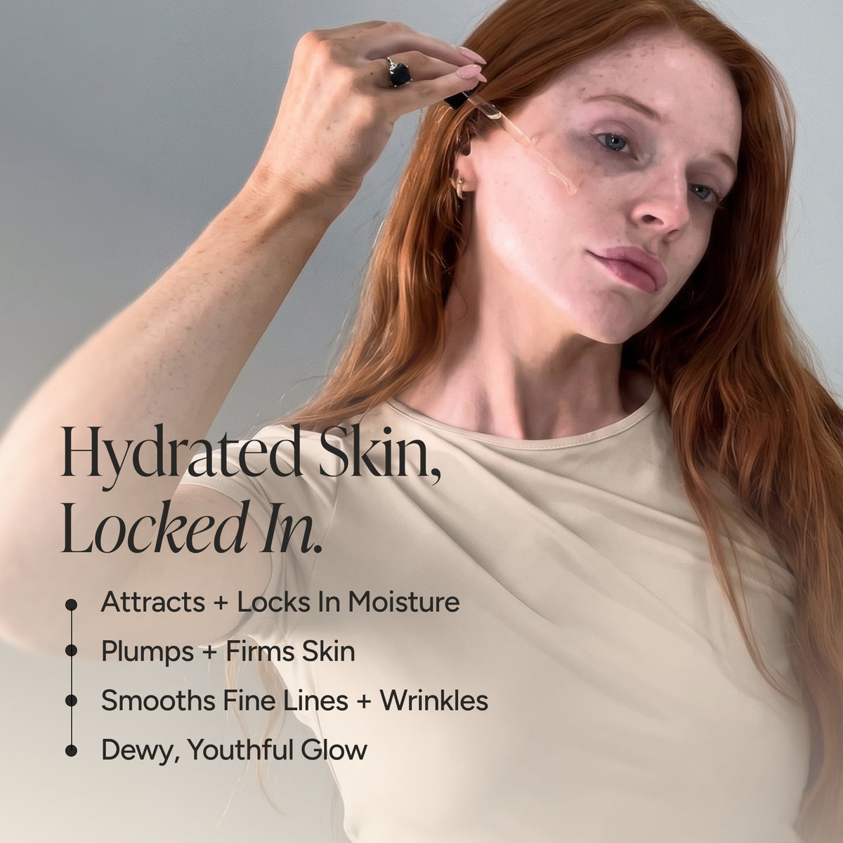 A woman with long red hair applies a skincare serum with a dropper to her face. The image features text overlays on the left reading 'Hydrated Skin, Locked In.