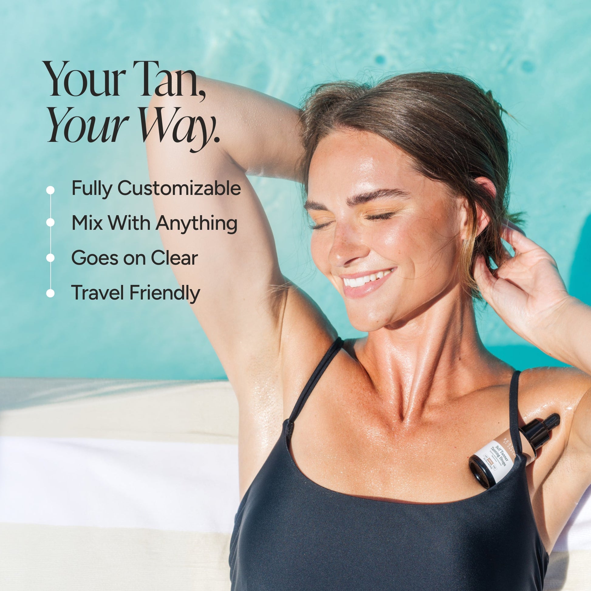 A woman outdoors by a turquoise pool wearing a black swimsuit, with text on the left reading 'Your Tan, Your Way.' and bullet points about customization, mixing with anything, going on clear, and travel-friendly.
