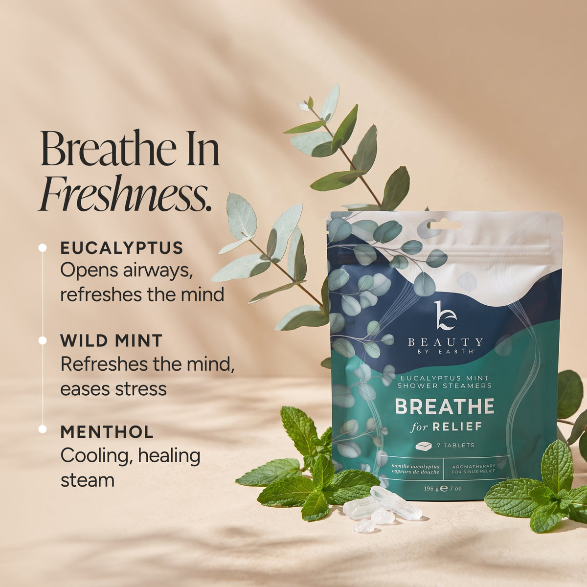 Beauty by Earth Breathe for Relief eucalyptus mint shower steam packet, styled with fresh mint leaves and eucalyptus branches on a warm beige background with text detailing its eucalyptus, wild mint, and menthol benefits.
