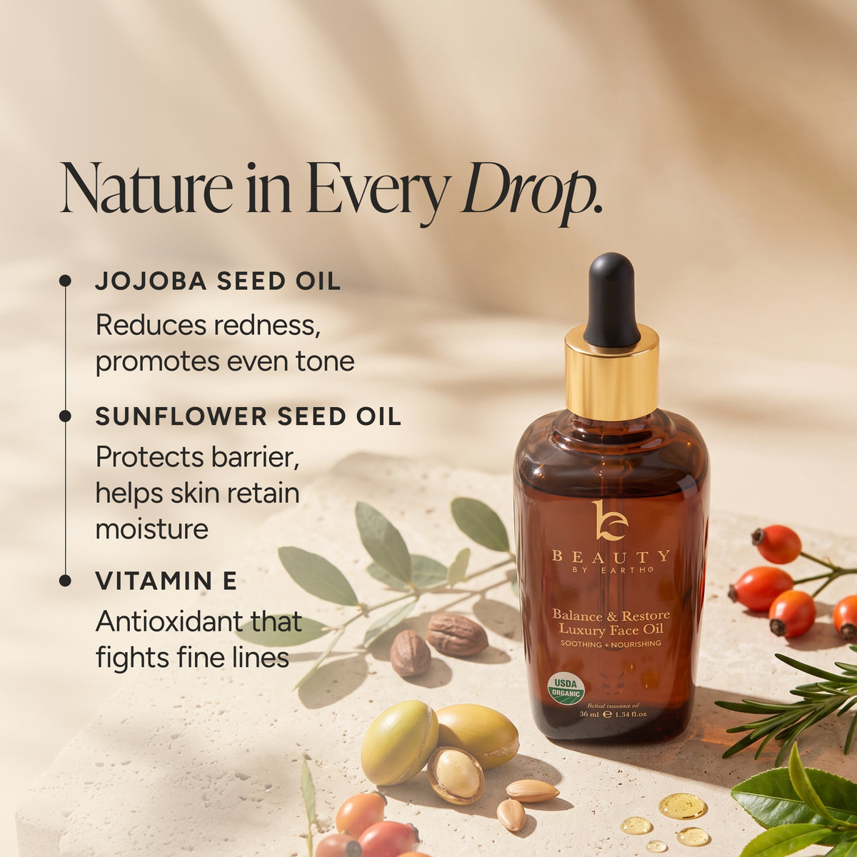 Beauty by Earth Face Oil in an amber glass dropper bottle with a gold collar and black cap, styled on a beige surface with jojoba seeds, almonds, green leaves, and red berries. Text on the left lists key ingredients and benefits.
