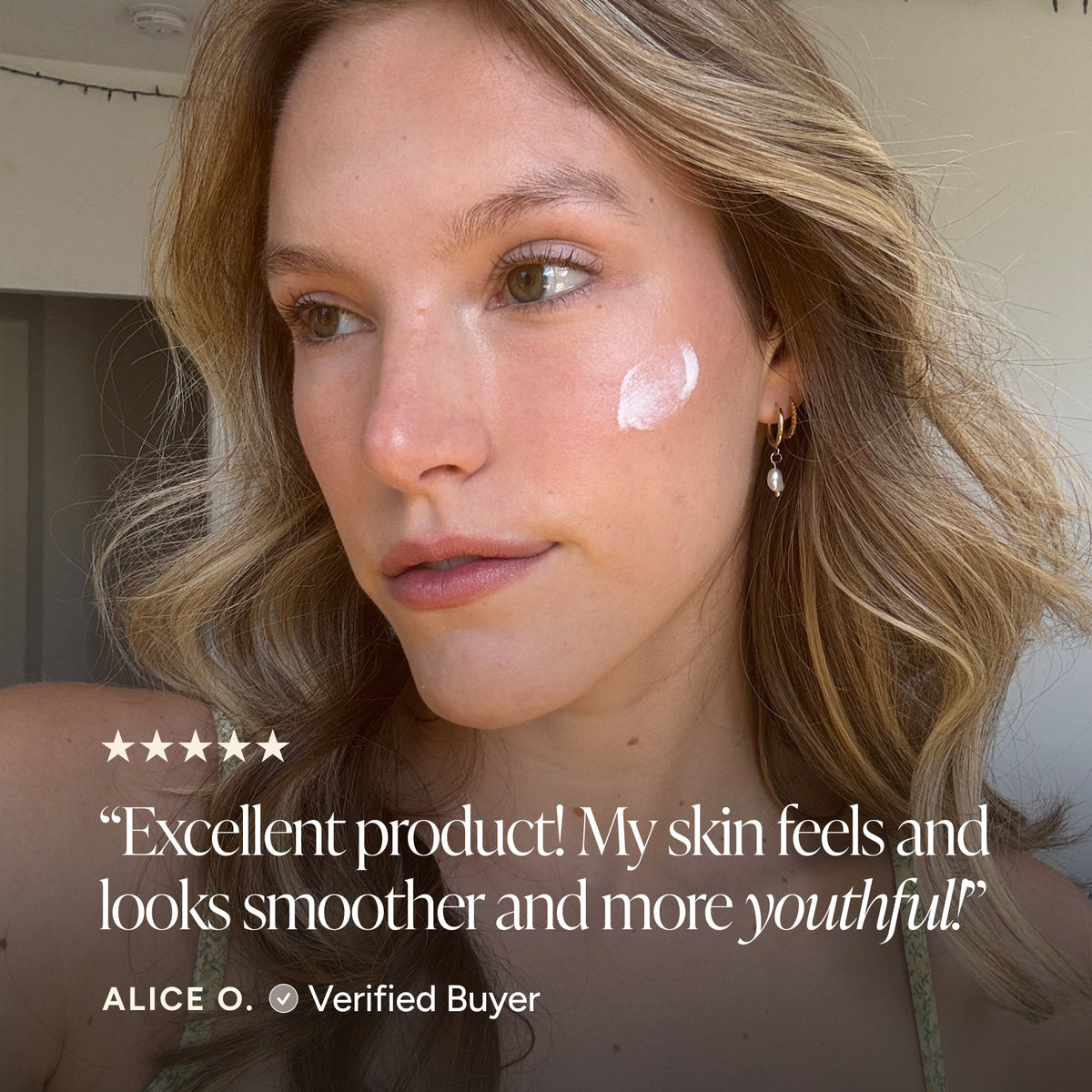 A close-up of a woman with a dollop of white skincare cream on her cheek, with a quote overlay reading 'Excellent product! My skin feels and looks smoother and more youthful!' and the name Alice O., Verified Buyer.