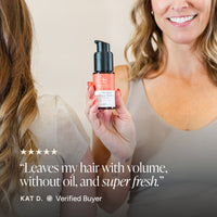 A woman holds up a bottle of Dry Shampoo with a customer testimonial overlay at the bottom.