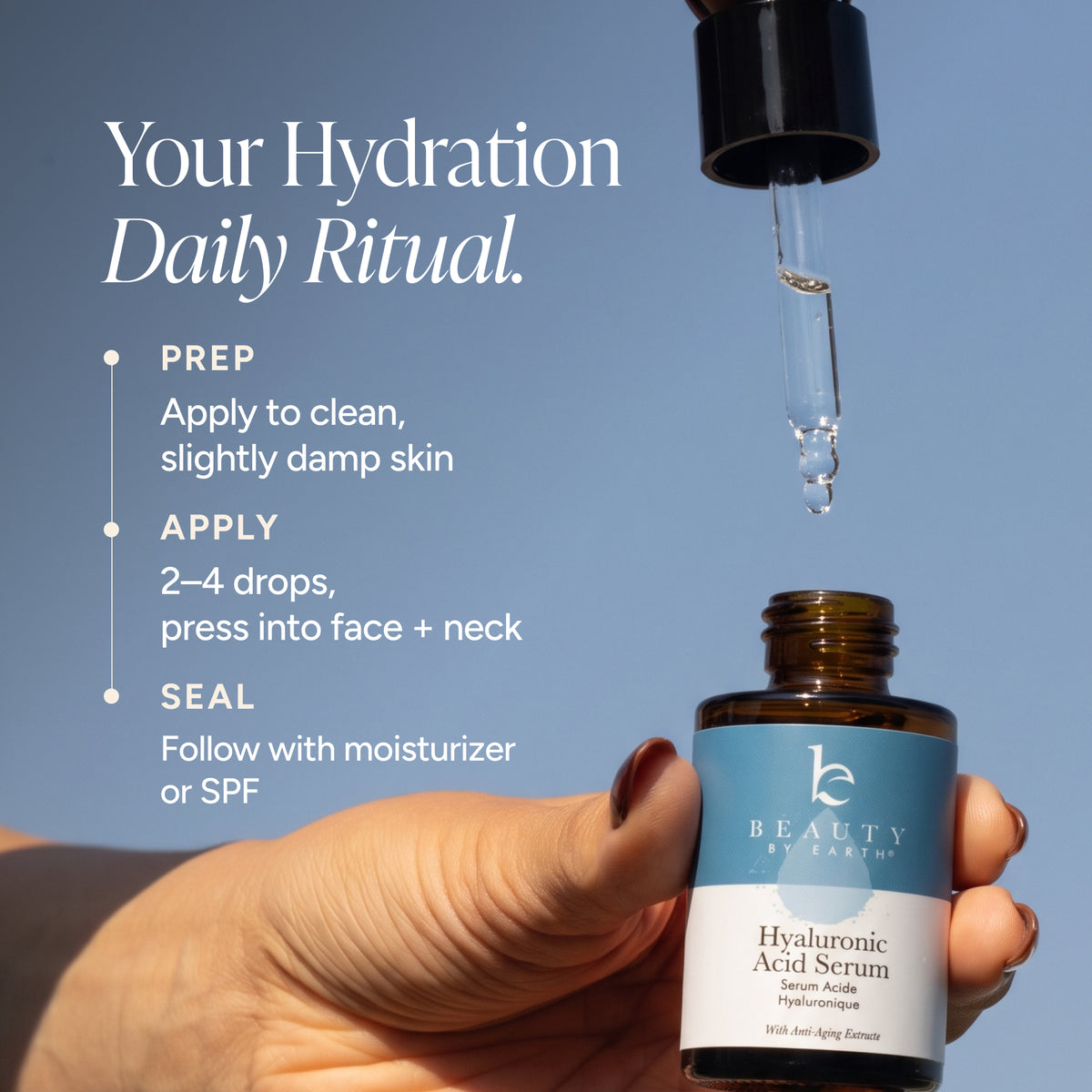 A hand holds a small amber bottle labeled Beauty by Earth Hyaluronic Acid Serum against a blue sky background, with a dropper above dispensing drops. Text on the left reads 'Your Hydration Daily Ritual' with application steps.