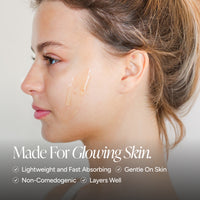 Close-up side profile of a woman with a small amount of serum applied to her cheek, with marketing text reading 'Made For Glowing Skin' and feature bullet points below on a soft light gray background.