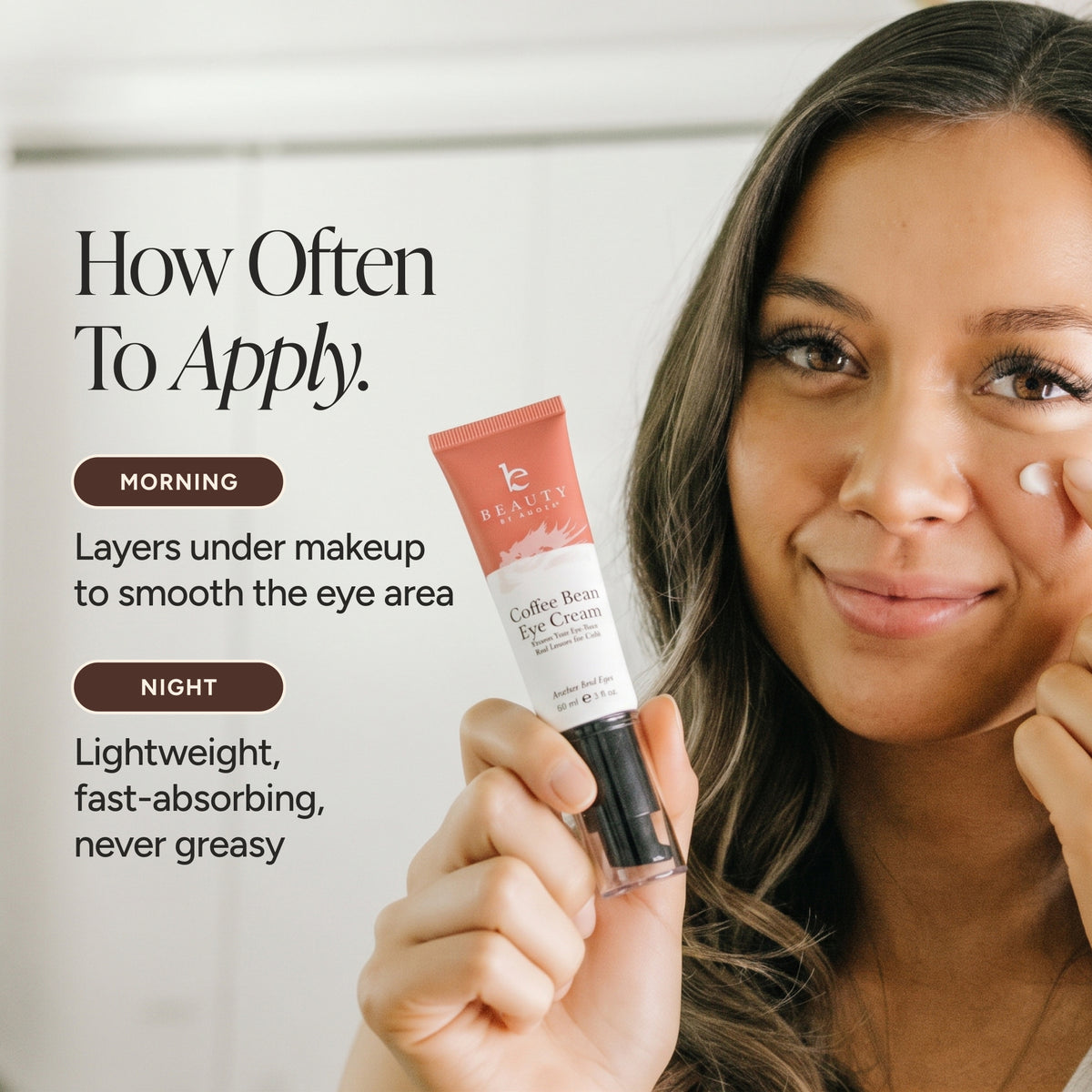 A woman applies eye cream to her eye area while holding a tube of Beauty by Earth Coffee Bean Eye Cream. The image includes text detailing application times for morning and night.