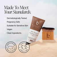 Beauty by Earth Self Tanner Tanning Lotion tube standing on sand next to a wooden-handled brush, with marketing text and certification seals on a pale sky-blue background.