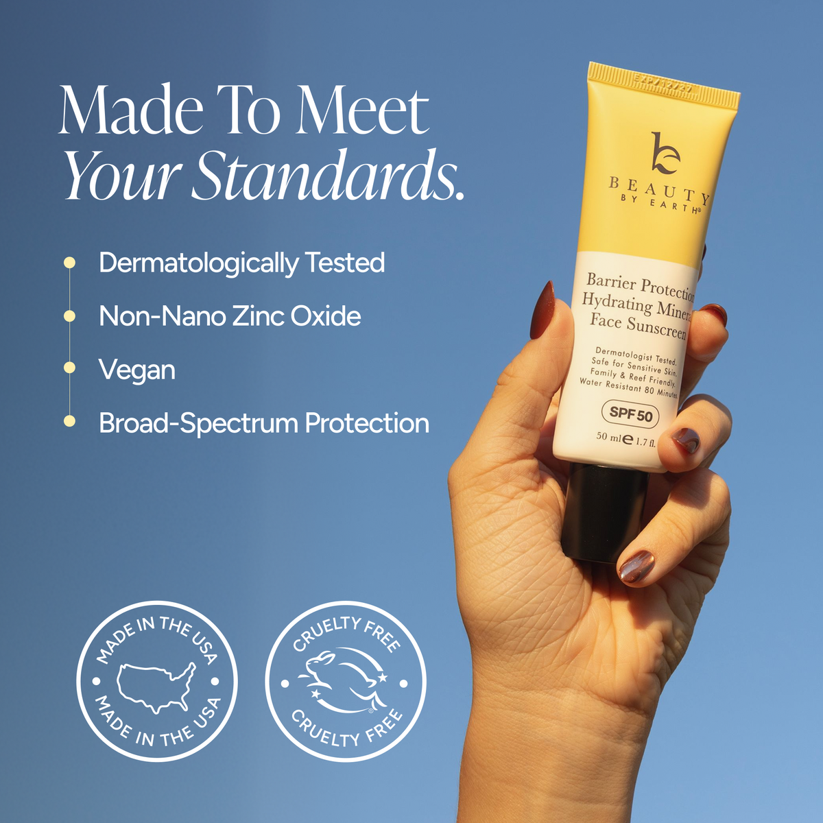 A hand holds a yellow and white tube of Beauty by Earth Face Sunscreen SPF 50 against a blue gradient background with marketing text and badges.