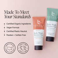 Beauty by Earth body wash shower gel products on a pale pink background with marketing text and certification badges. One tube is coral/peach and one is mint green, both with white lower sections and black caps.