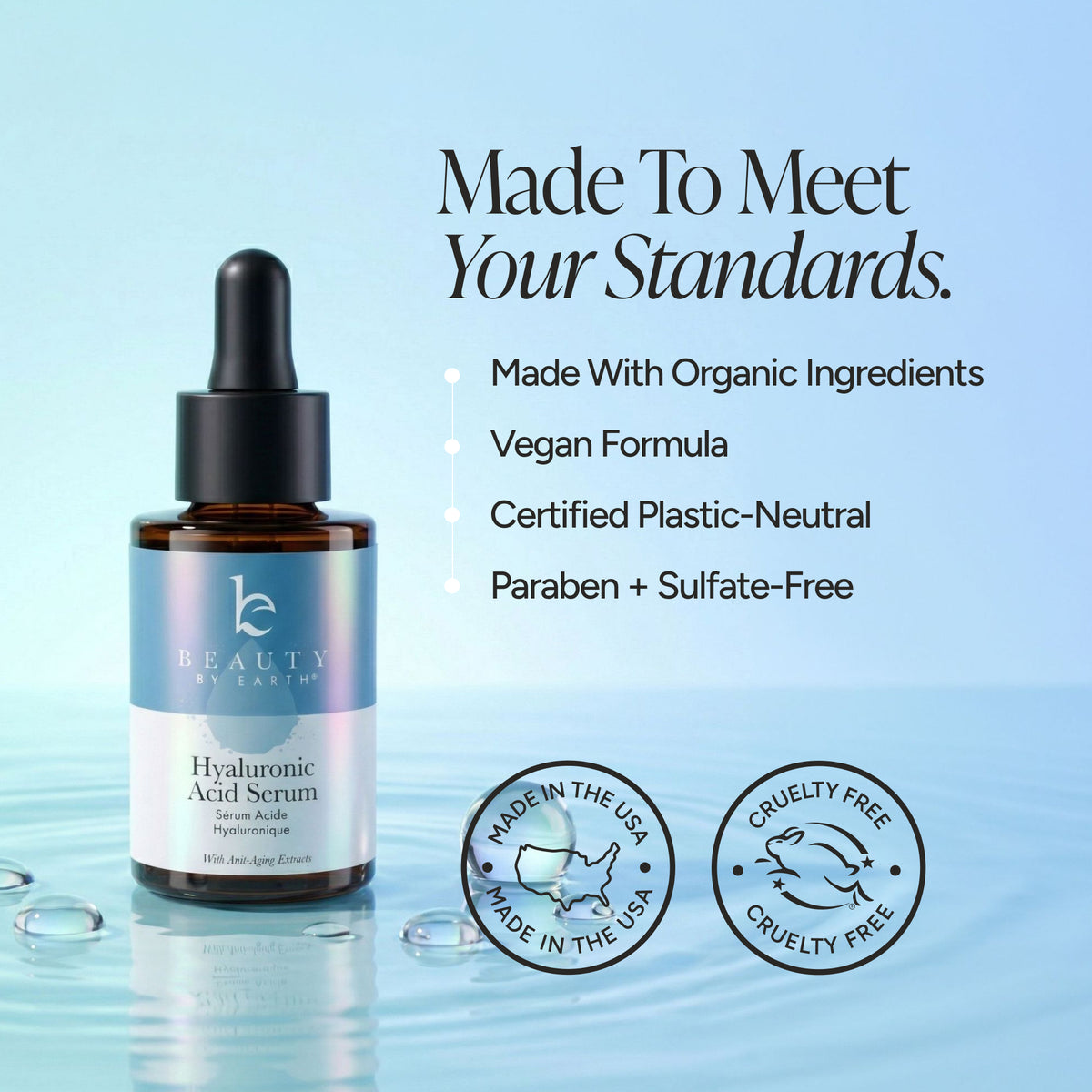 Beauty by Earth Hyaluronic Acid Serum in an amber glass dropper bottle with a black cap, set against a light blue water-textured background with product benefits and certification badges.