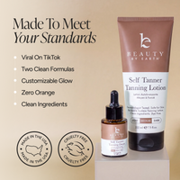 Beauty by Earth Self Tanner Tanning Lotion in a brown and white squeeze tube, shown alongside a matching dropper bottle of Tanning Drops on a beige background with promotional text and badges.