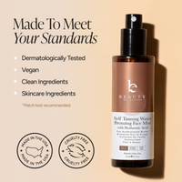 A bottle of Water Bronzing Face Mist on a warm beige background with marketing text and certification badges. The product is a dark amber spray bottle with a black pump and a white label.