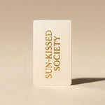 Beige card with 'Sun-Kissed Society' text on a beige background