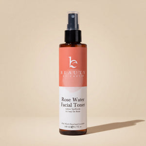 Rose Water Facial Toner bottle with a beige background
