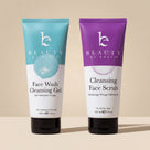Two tubes of 'Beauty by Earth' skincare products on a beige background