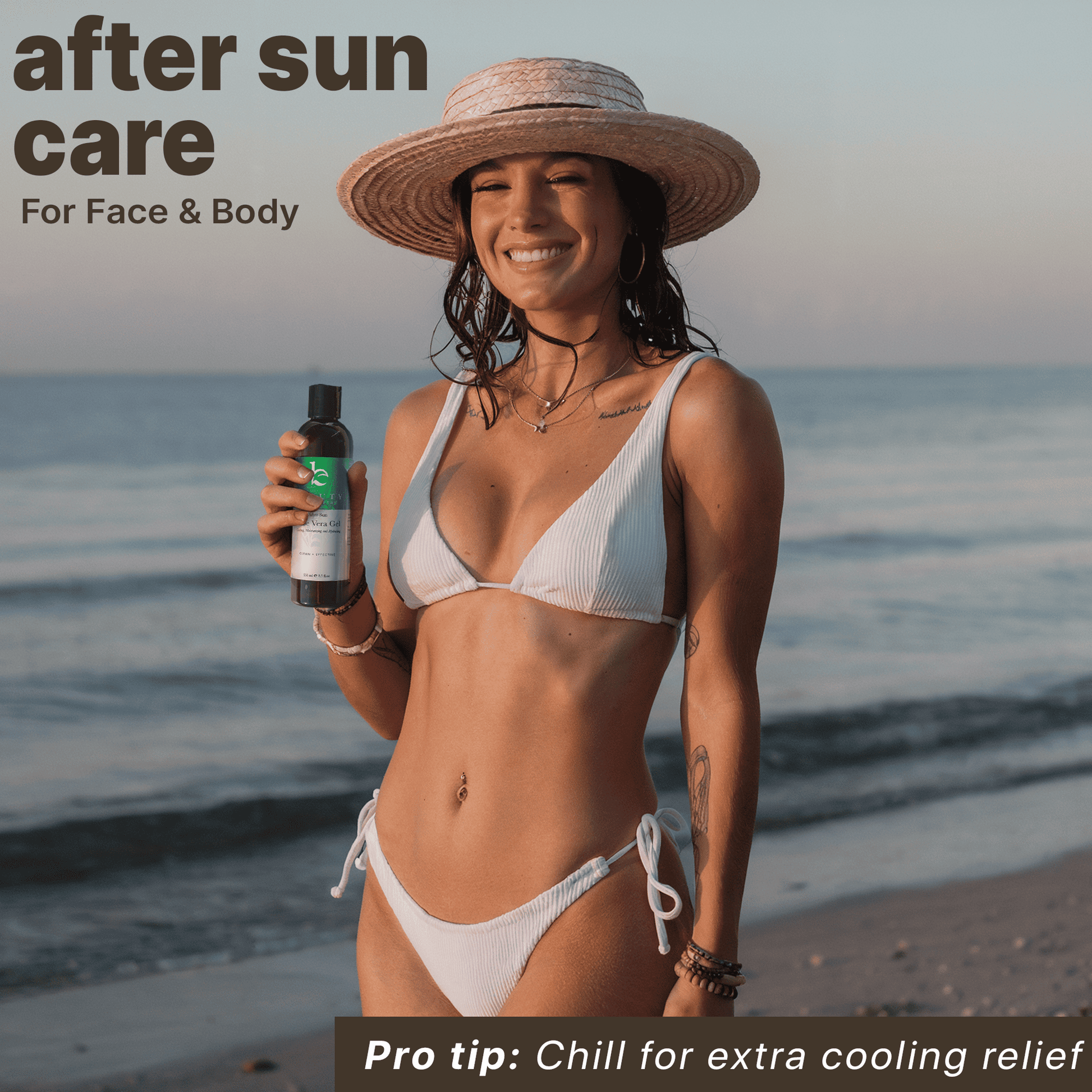 Woman in a bikini holding an after sun care product on a beach
