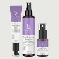 Three skincare products with purple labels on a white background