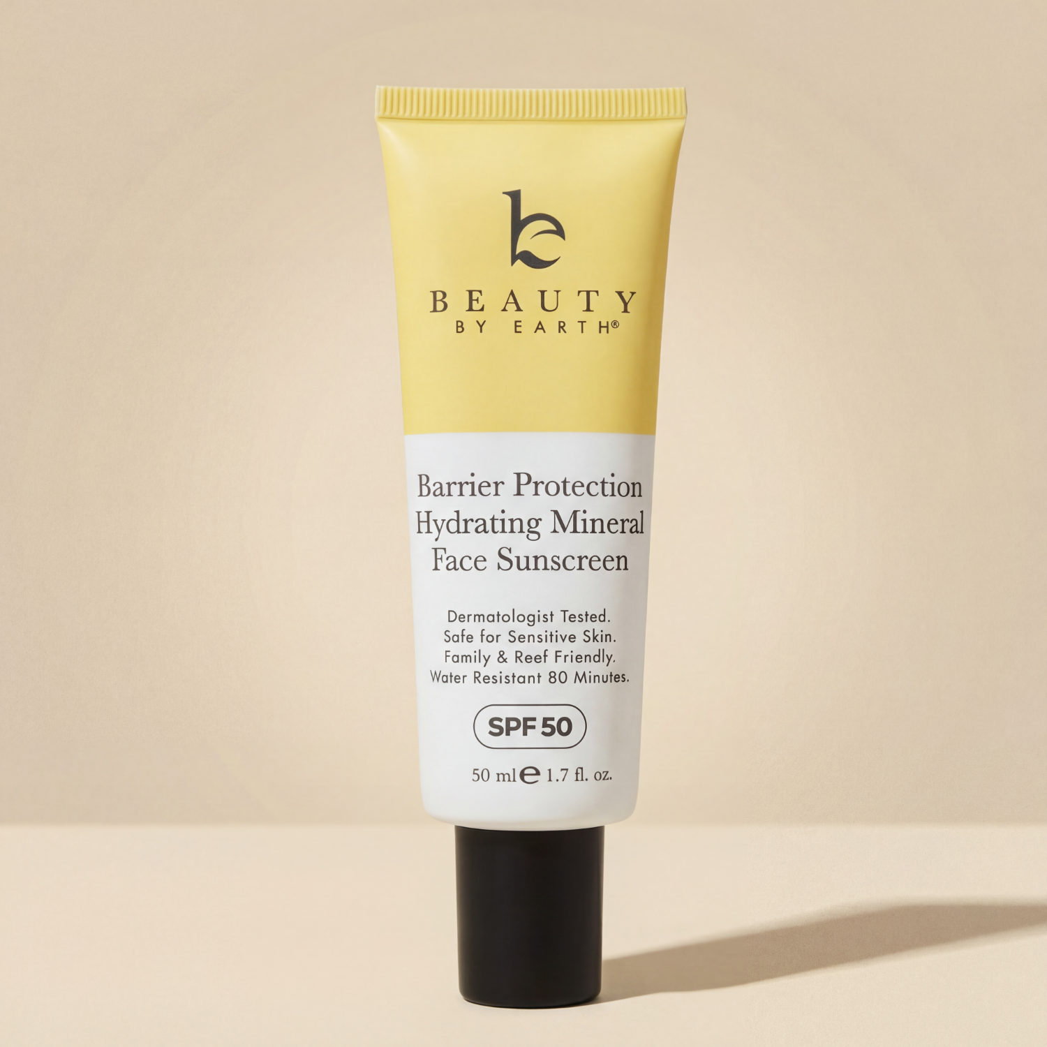 Tube of Beauty by Earth sunscreen on a beige background