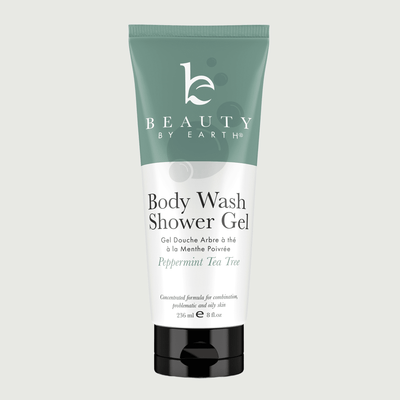 Body wash shower gel peppermint tea tree tube with 'Beauty by Earth' branding on a light gray background