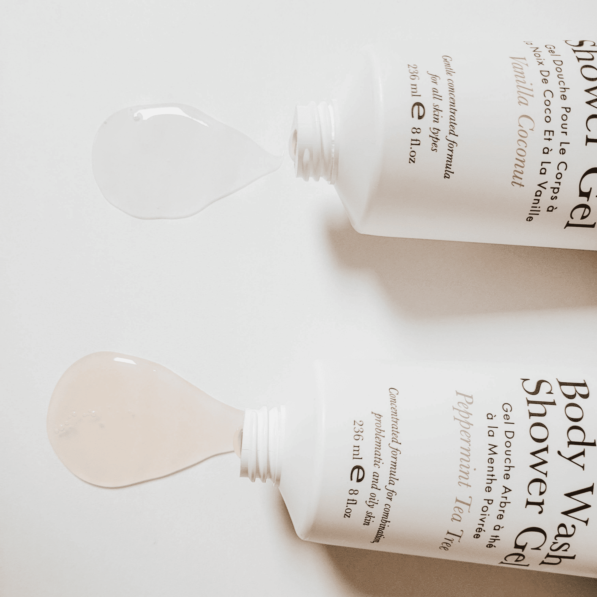 Texture of body wash shower gels peppermint tea tree and vanilla coconut