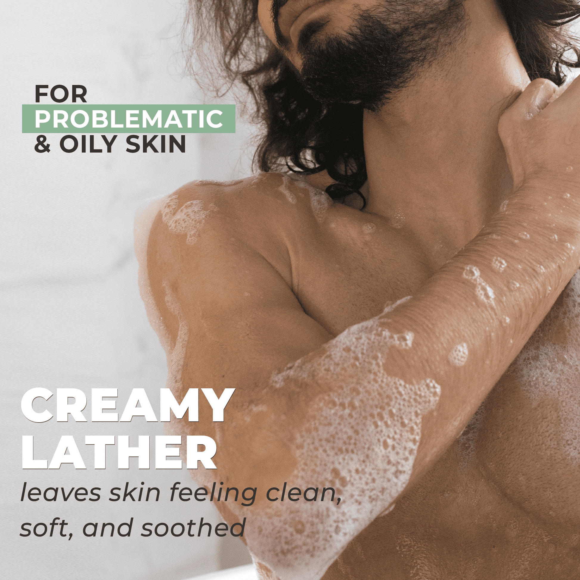 For problematic and oily skin, creamy lather leaves skin feeling clean, soft and soothed - model using body wash shower gel on body