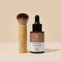 Bottle of Beauty By Earth Tanning Drops with Kabuki Brush