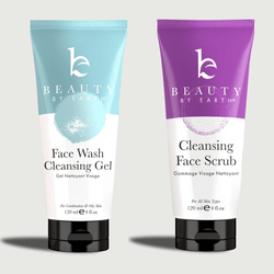 Two tubes of 'Beauty by Earth' skincare products on a light gray background