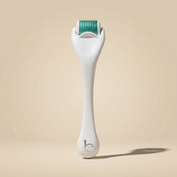 Derma Roller on beige background