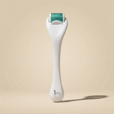 Derma Roller on beige background