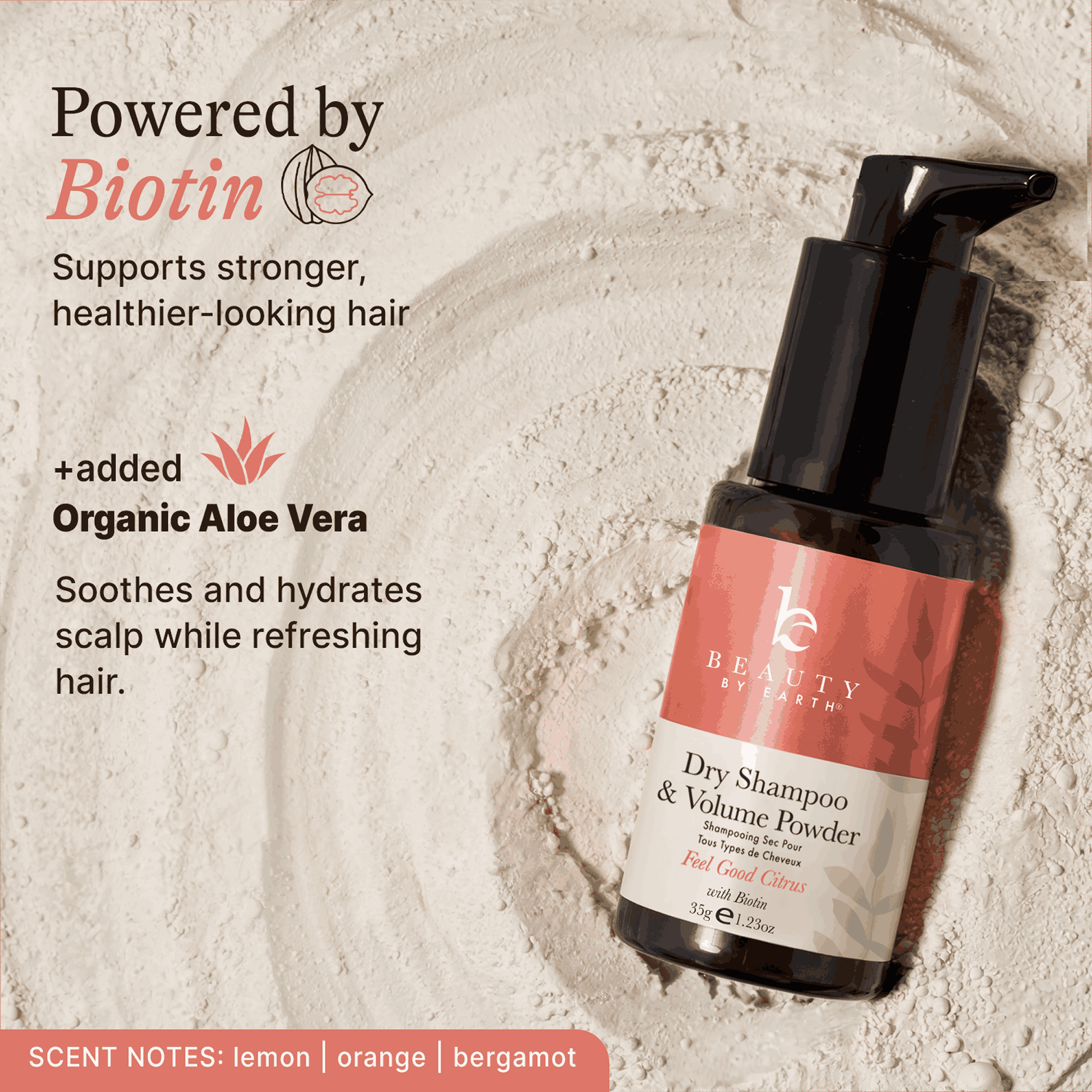 Dry shampoo and volume powder bottle with text about Biotin and Aloe Vera on a textured background
