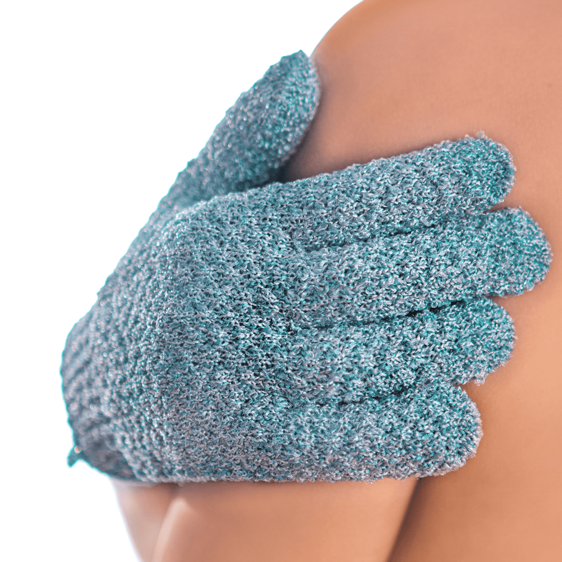 Heavy exfoliating glove on a person's arm against a white background