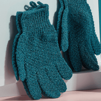 Pair of exfoliating gloves on a light background