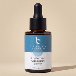 Hyaluronic Acid Serum bottle with blue label on beige background