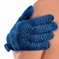 Blue exfoliating glove being used on a person's shoulder against a white background