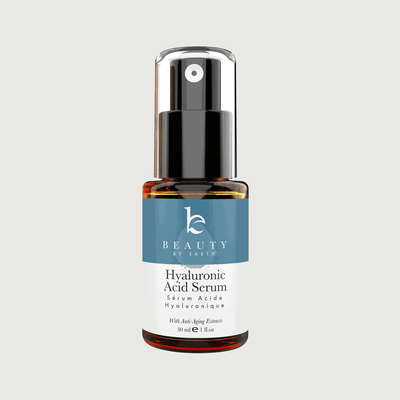 Hyaluronic Acid Serum bottle with blue label on a light gray background