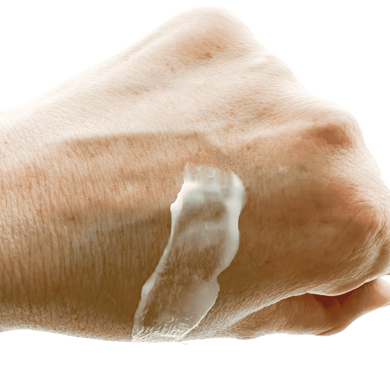 Hand with soap lather on a white background