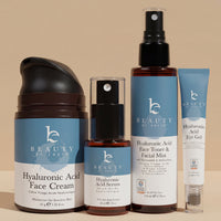 Collection of Beauty by Earth skincare products on a beige background