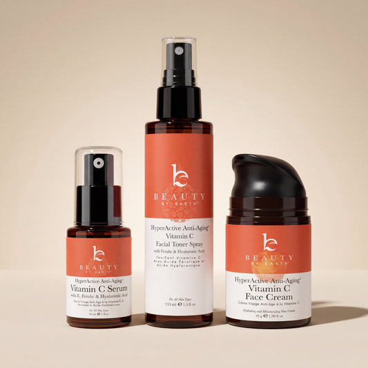Three skincare products from Beauty by Earth on a beige background