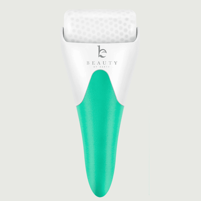 White and green roller with Beauty by Earth branding on a light gray background