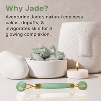 Aventurine Jade roller and stones with a candle on a neutral background, promoting natural skincare benefits.