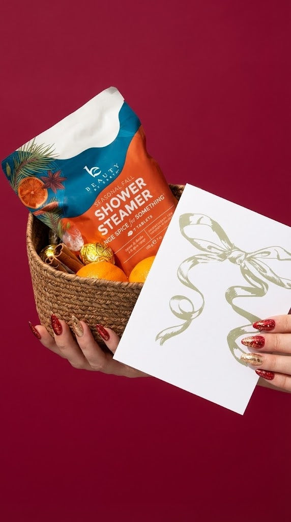 Gift Basket Basket with Orange Spice shower steamer and oranges on a red background